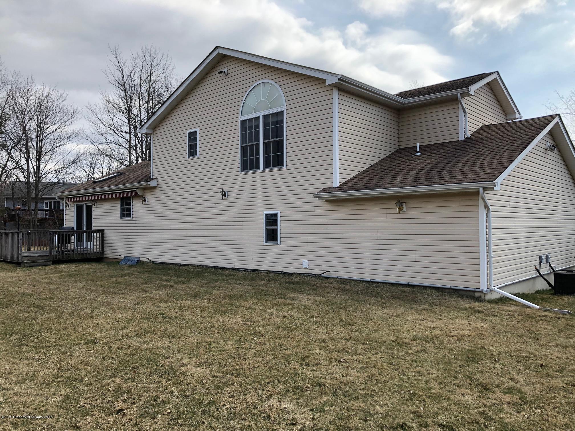 1155 Sunside Road Long Pond, PA 18334 - Photo 5 of 5 a view of a house with a yard
