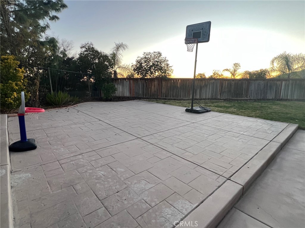 11617 Harvard Way Yucaipa, CA 92399 - Photo 56 of 58 a backyard of a house with wooden fence