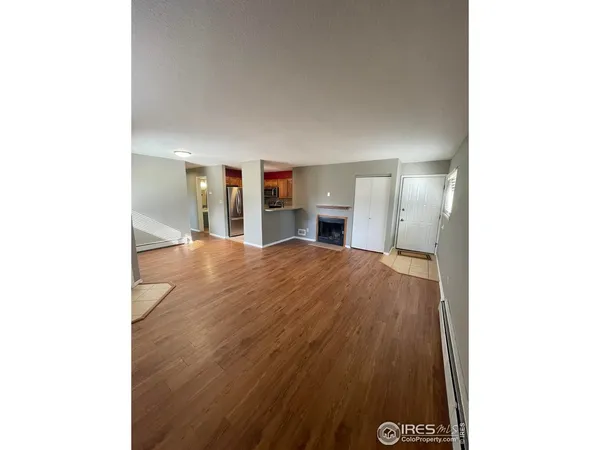 a view of a kitchen from the hallway