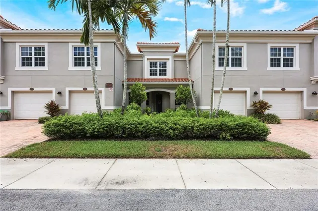 front view of a house with a garden
