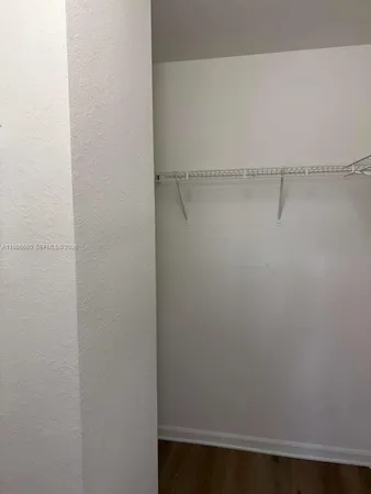 a bathroom with a shower and a toilet