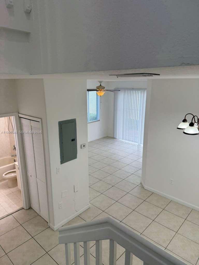 2470 Southeast 15th Place, Unit 335 Homestead, FL 33035 - Photo 19 of 33 a view of a livingroom with wooden floor