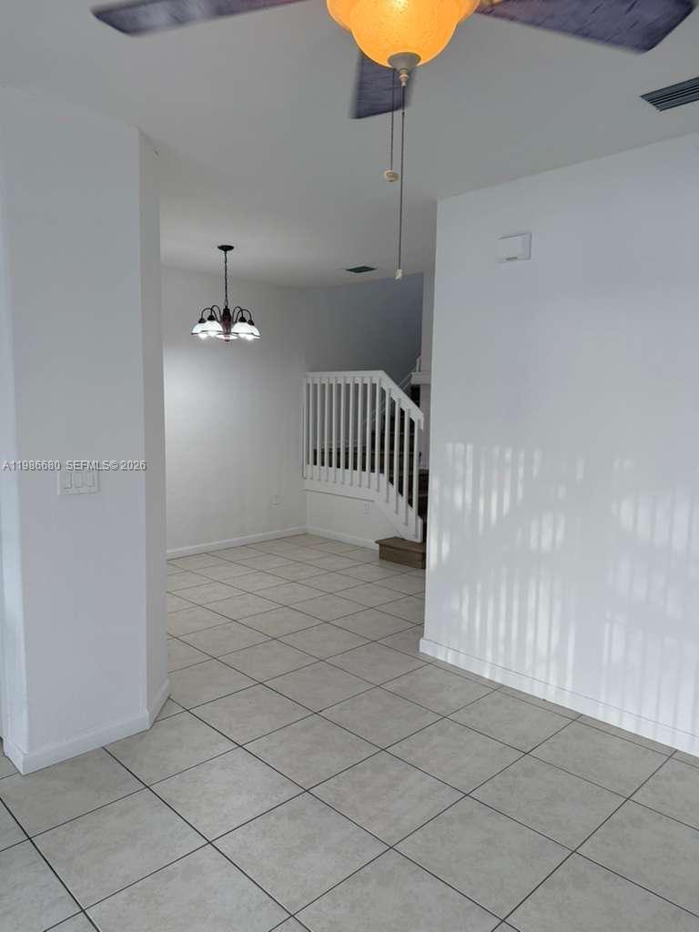 2470 Southeast 15th Place, Unit 335 Homestead, FL 33035 - Photo 24 of 33 a view of an empty room and entryway