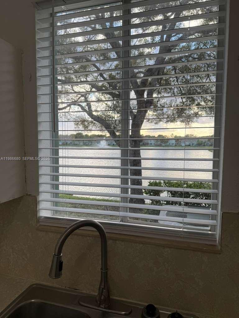 2470 Southeast 15th Place, Unit 335 Homestead, FL 33035 - Photo 25 of 33 a bathroom with a sink