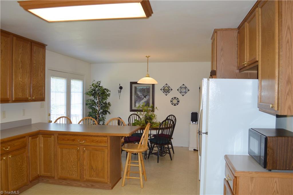 5895 Stanley Huff Road Summerfield, NC 27358 - Photo 15 of 30 Kitchen/Dining