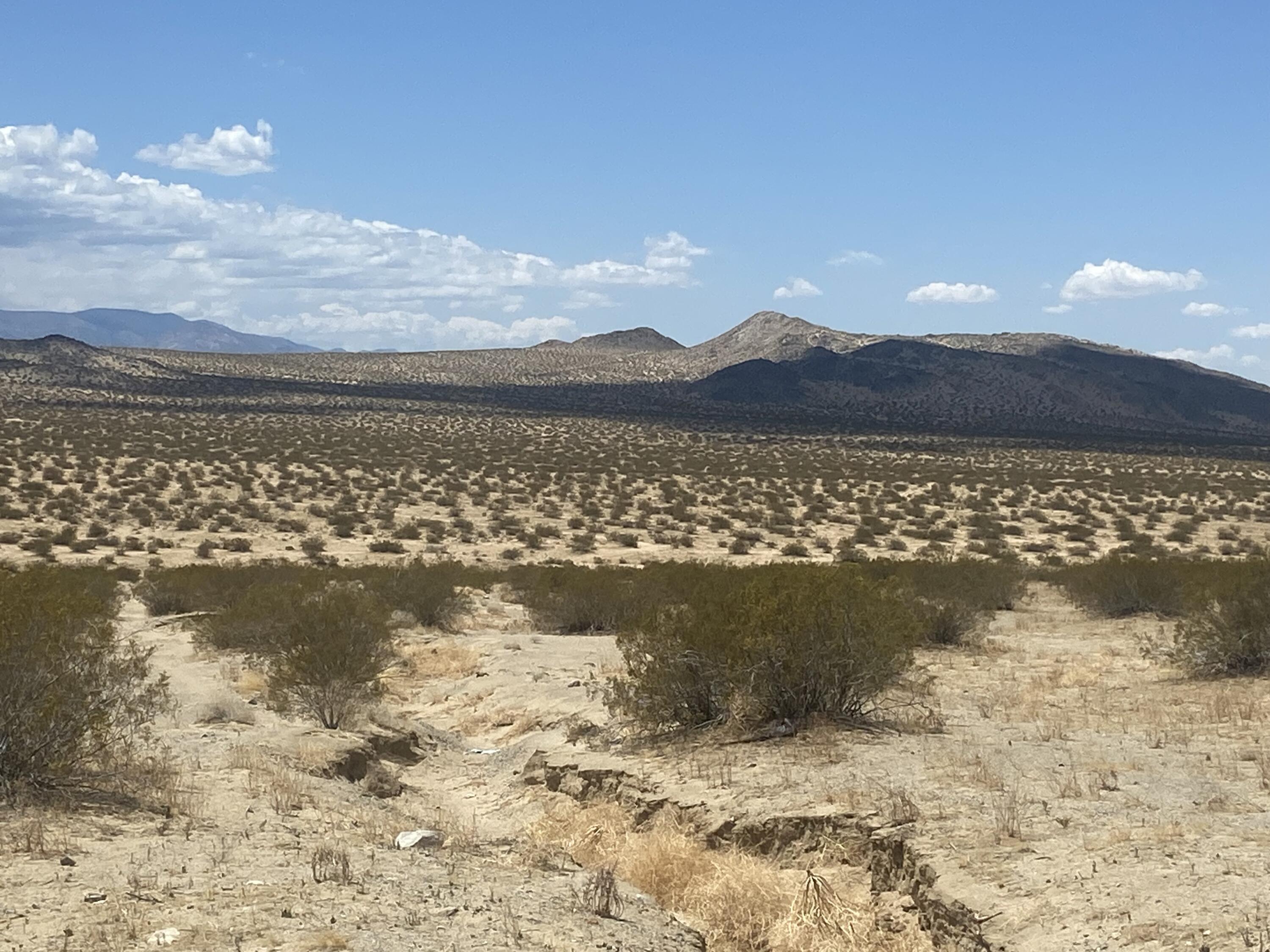 128 Caspers Road Landers, CA 92285 - Photo 19 of 25 a view of lake view and mountain view