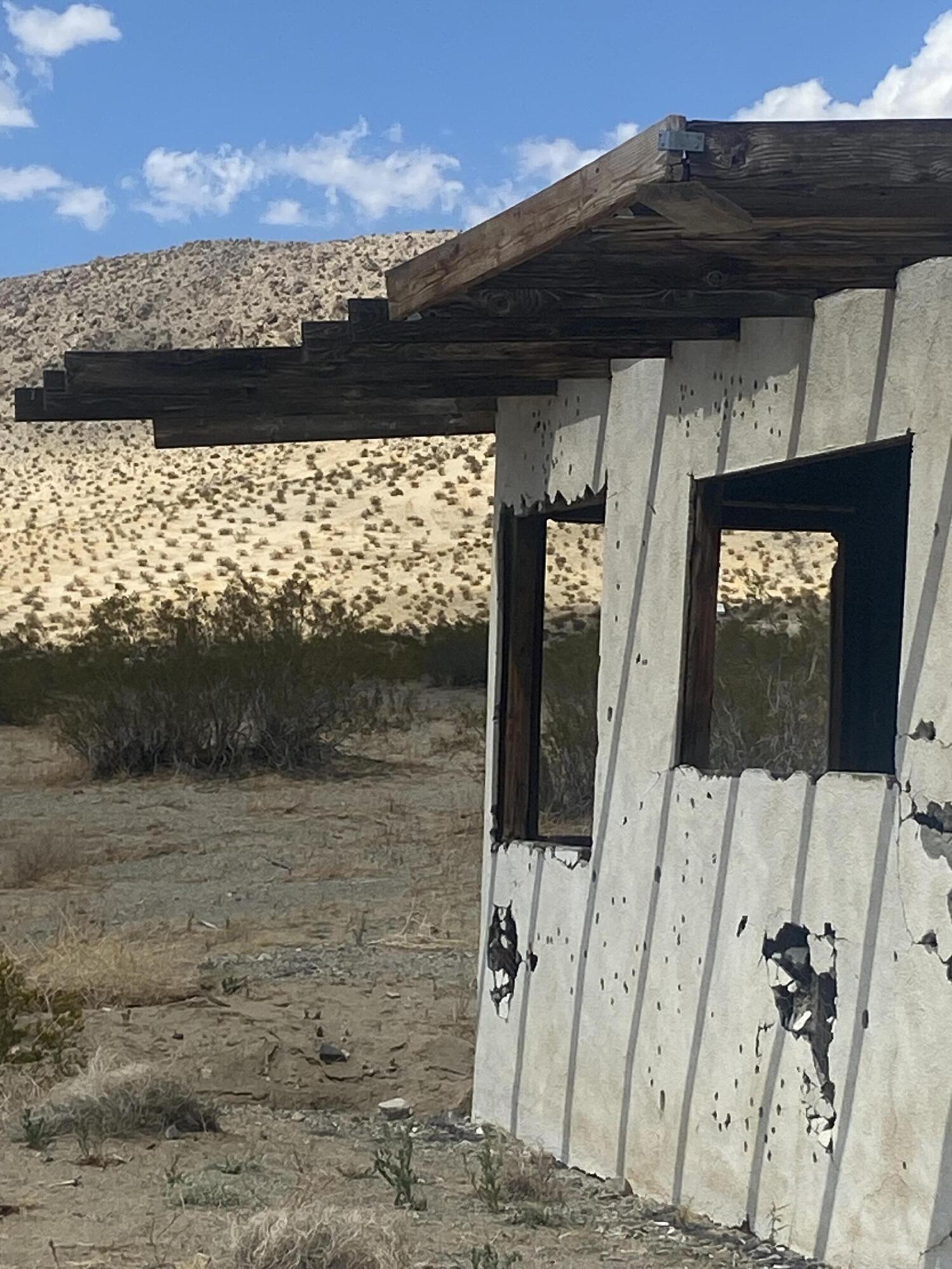 128 Caspers Road Landers, CA 92285 - Photo 2 of 25 a view of a door of the house