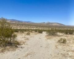 128 Caspers Road Landers, CA 92285 - Photo 9 of 25 a view of lake and mountain