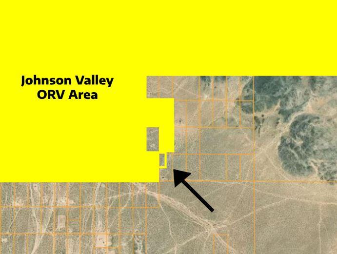 128 Caspers Road Landers, CA 92285 - Photo 10 of 25 a view of a swimming pool with an outdoor space and seating area