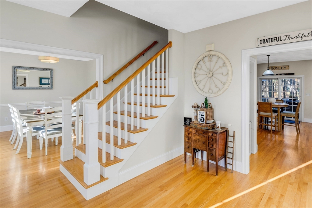 53 Emily Lane Rowley, MA 01969 - Photo 15 of 42 a view of a dining room with furniture and wooden floor