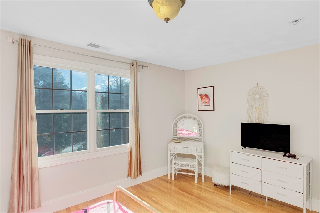 53 Emily Lane Rowley, MA 01969 - Photo 22 of 42 a view of a livingroom with furniture and a flat screen tv