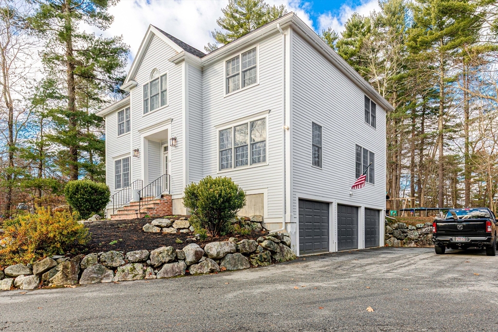 53 Emily Lane Rowley, MA 01969 - Photo 3 of 42 a view of a house with a yard