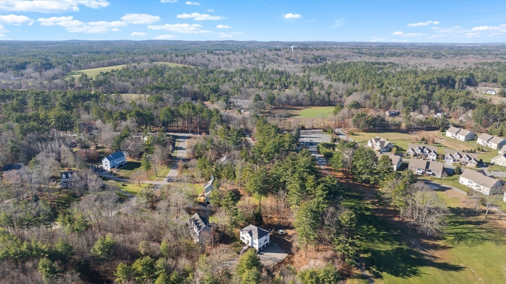53 Emily Lane Rowley, MA 01969 - Photo 38 of 42 a view of a city with green field