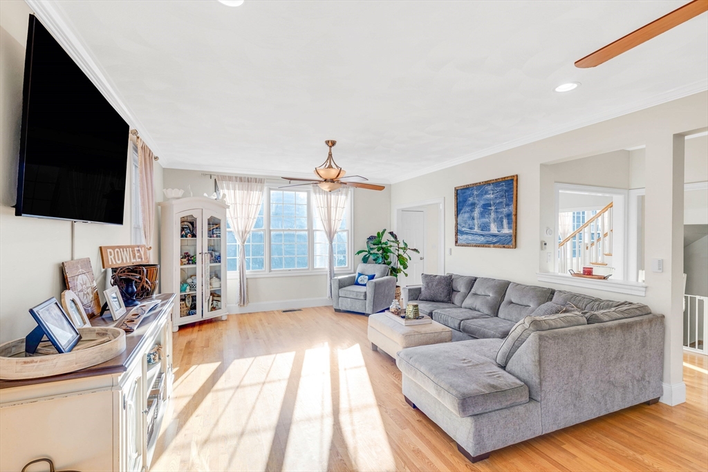 53 Emily Lane Rowley, MA 01969 - Photo 5 of 42 a living room with furniture fireplace and flat screen tv