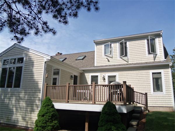34 Monomoscoy Road Mashpee, MA 02649 - Photo 5 of 16 a view of a house with a porch