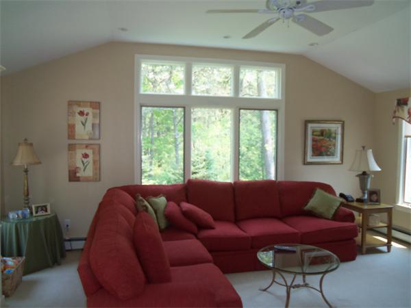 34 Monomoscoy Road Mashpee, MA 02649 - Photo 6 of 16 a living room with furniture and a large window