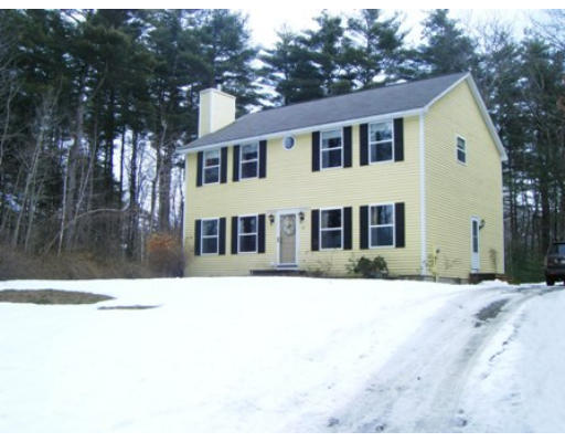 45 Wheeler Road Bolton, MA 01740 - Photo 1 of 1 a black white building with a outdoor space