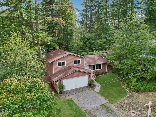 front view of a house with a yard