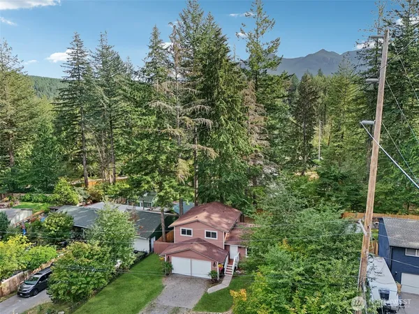 an aerial view of a house with a garden