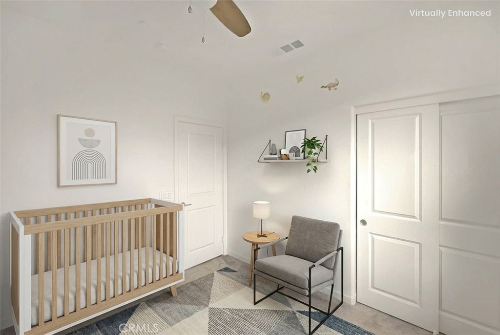 9412 Shade Place Rancho Cucamonga, CA 91730 - Photo 11 of 31 a living room with furniture and a window