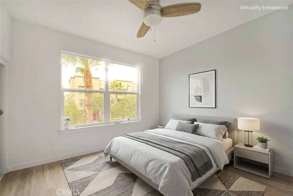 9412 Shade Place Rancho Cucamonga, CA 91730 - Photo 12 of 31 a bedroom with a bed and a window