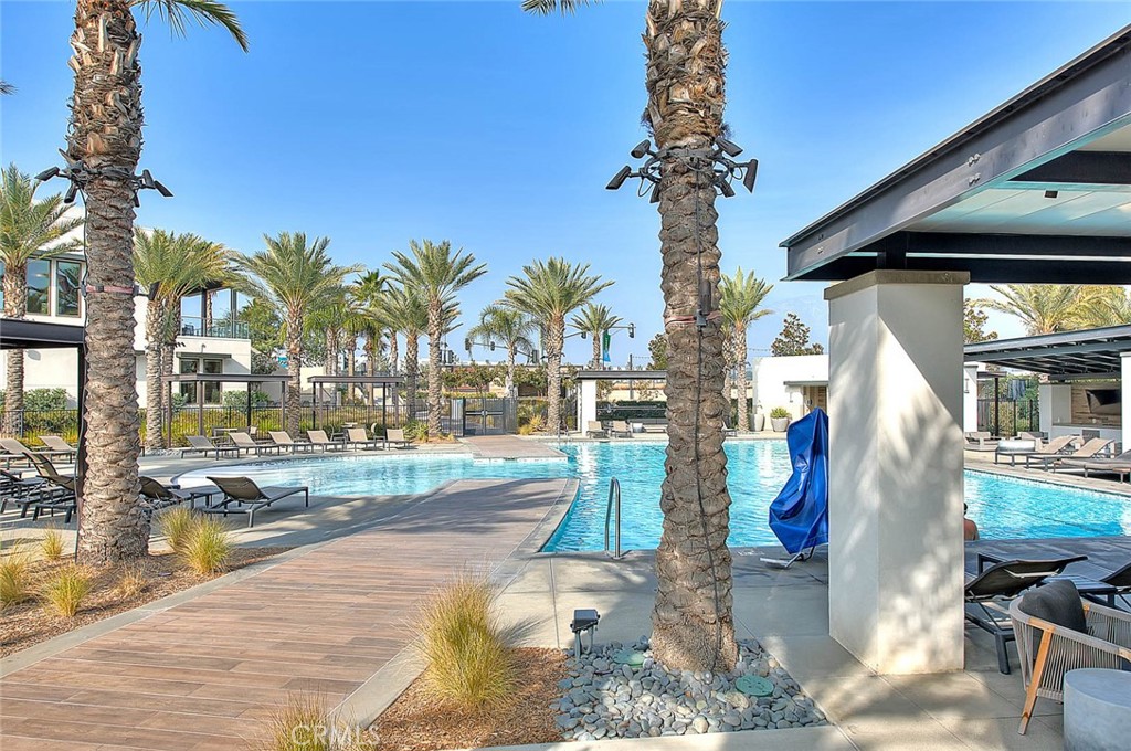 9412 Shade Place Rancho Cucamonga, CA 91730 - Photo 21 of 31 a view of a swimming pool with outdoor seating