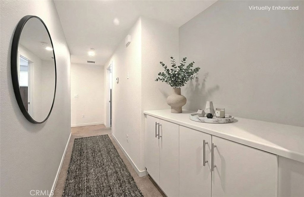 9412 Shade Place Rancho Cucamonga, CA 91730 - Photo 7 of 31 a bathroom with a sink and a mirror