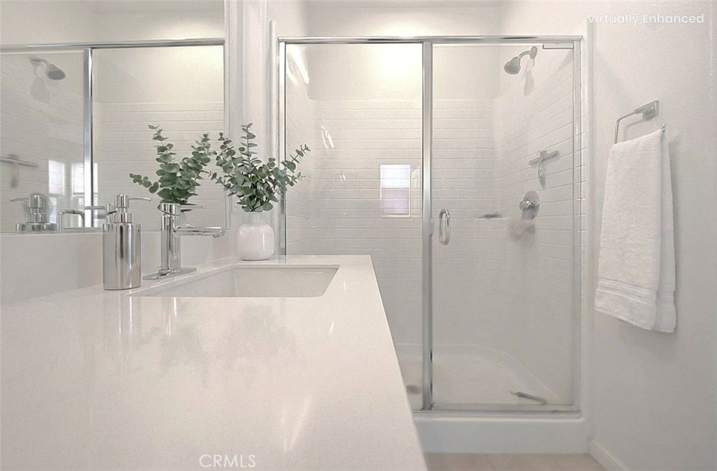 9412 Shade Place Rancho Cucamonga, CA 91730 - Photo 10 of 31 a bathroom with a shower