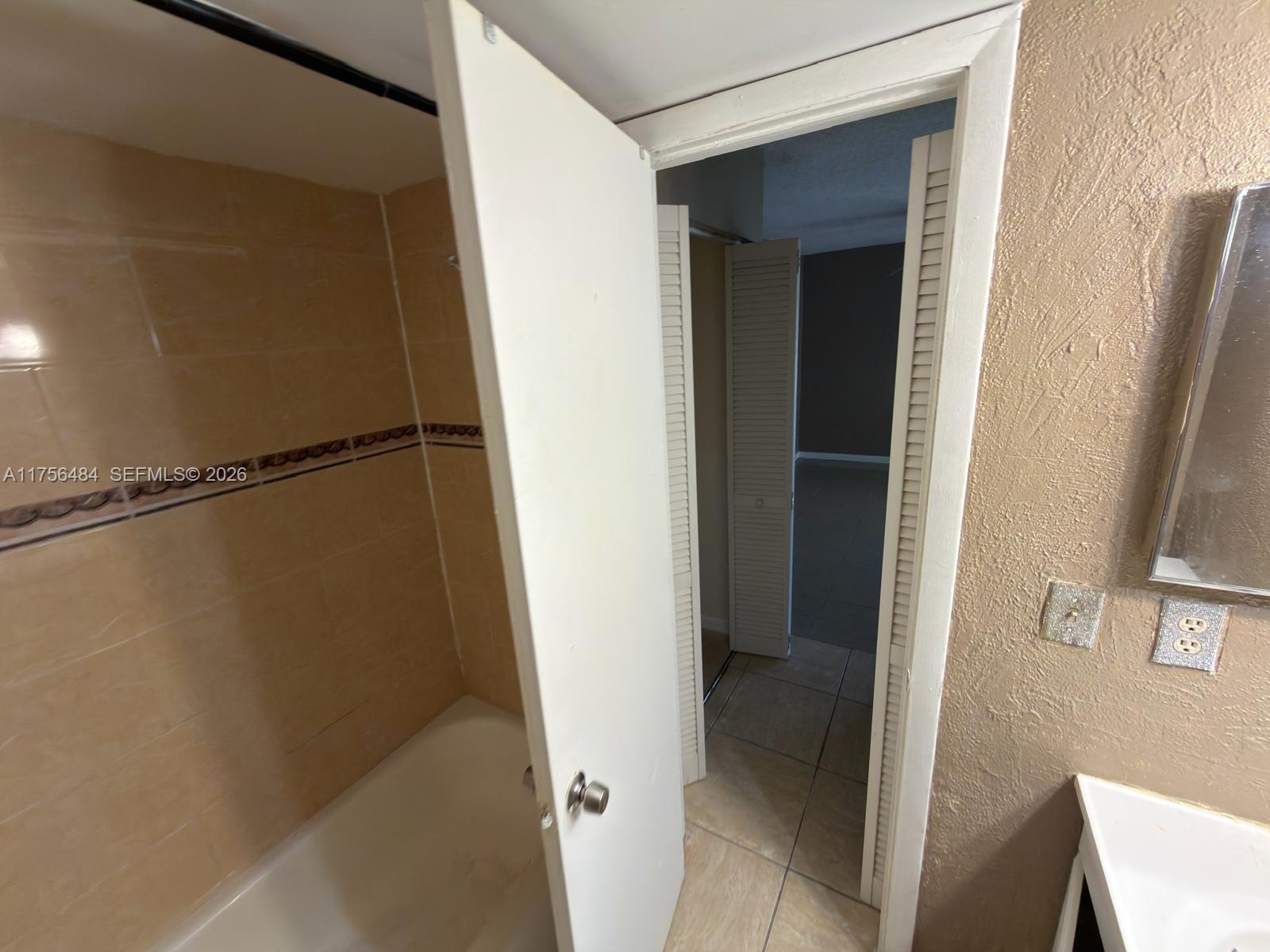 3400 Foxcroft Road, Unit 212 Miramar, FL 33025 - Photo 14 of 22 a view of closet