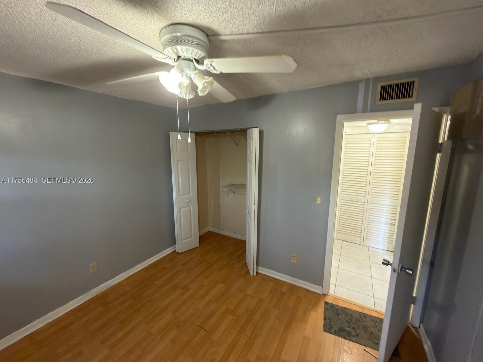 3400 Foxcroft Road, Unit 212 Miramar, FL 33025 - Photo 21 of 22 a view of a livingroom with a chandelier