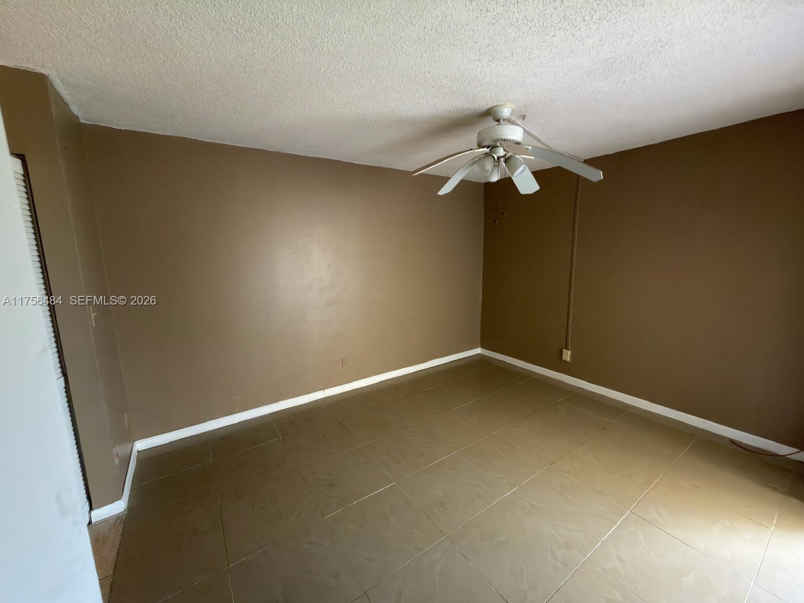 3400 Foxcroft Road, Unit 212 Miramar, FL 33025 - Photo 10 of 22 a window in an empty room