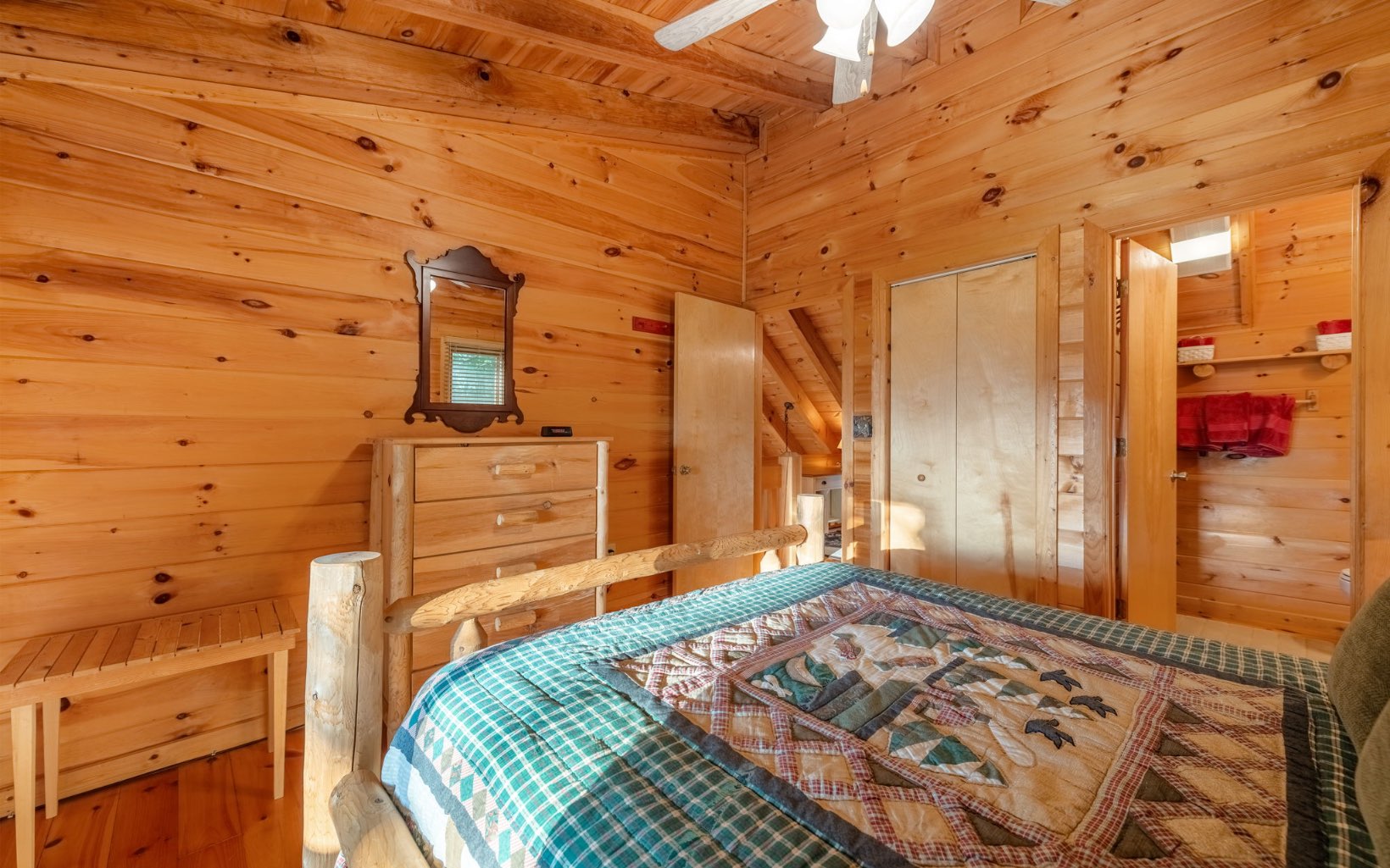 29 Maggie Chapman Road Blue Ridge, GA 30513 - Photo 22 of 40 a bedroom with a bed and wooden floor