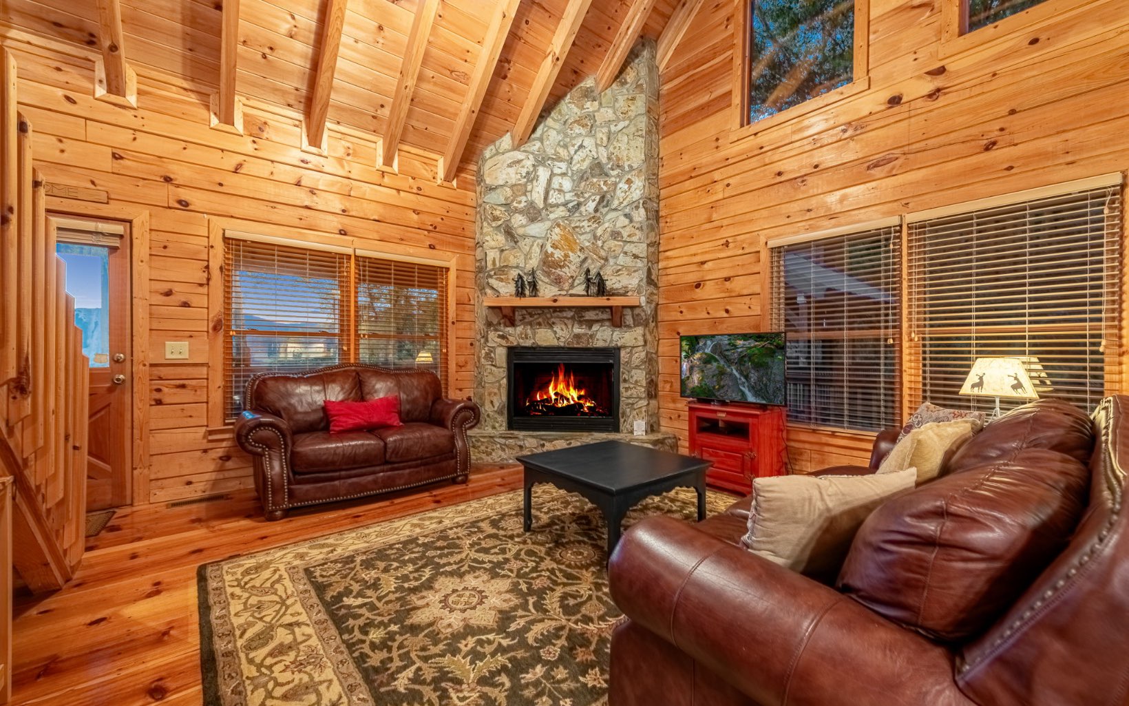 29 Maggie Chapman Road Blue Ridge, GA 30513 - Photo 3 of 40 a living room with furniture windows and a fireplace