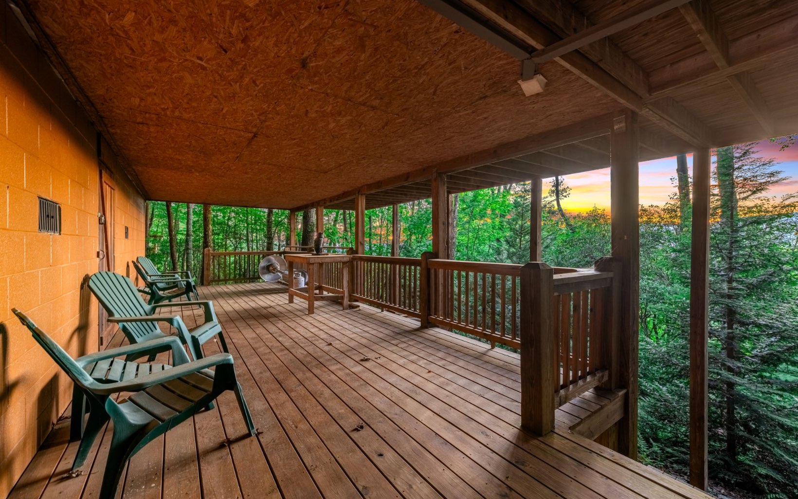 29 Maggie Chapman Road Blue Ridge, GA 30513 - Photo 39 of 40 a view of a patio with table and chairs and wooden floor