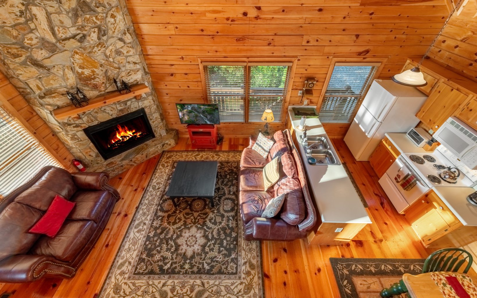 29 Maggie Chapman Road Blue Ridge, GA 30513 - Photo 5 of 40 front view of a fireplace with a rug