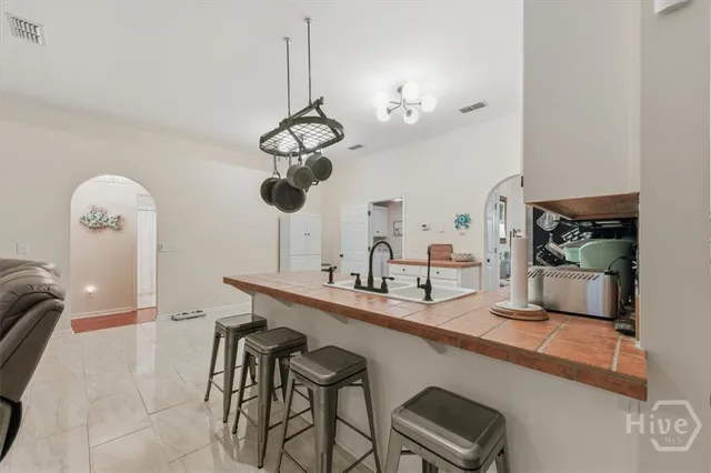 $429,900 | 195 Brittany Court, Richmond Hill, GA 31324