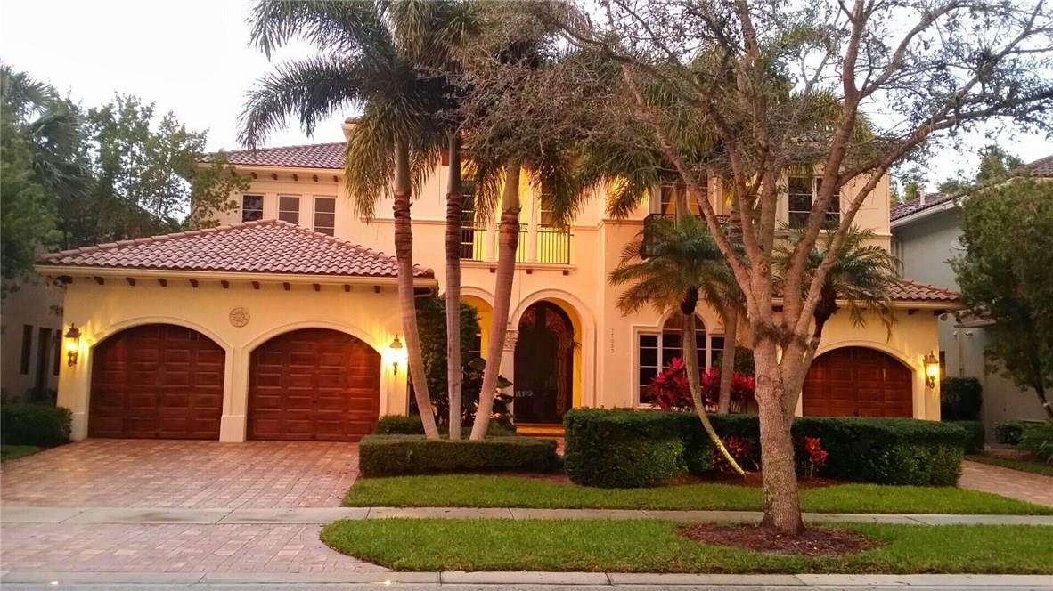 17665 Middlebrook Way Boca Raton, FL 33496 - Photo 1 of 17 a front view of a house with garden