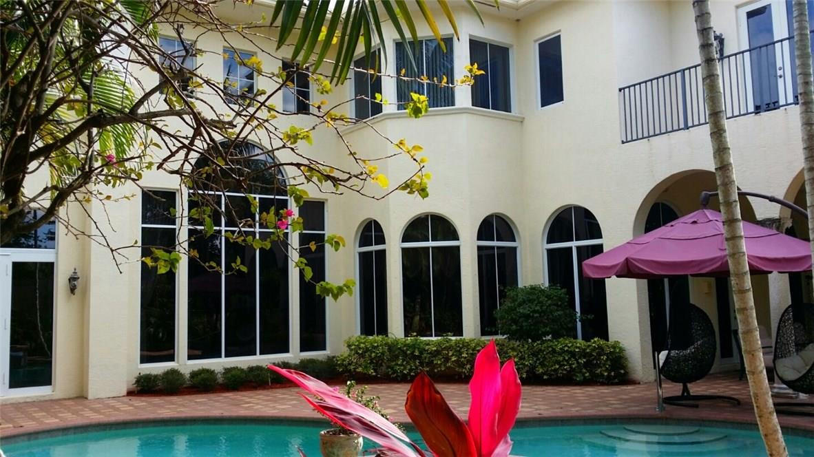 17665 Middlebrook Way Boca Raton, FL 33496 - Photo 15 of 17 front view of a house with a yard