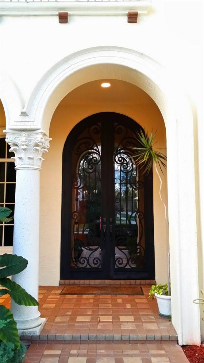 17665 Middlebrook Way Boca Raton, FL 33496 - Photo 2 of 17 a view of building with glass door