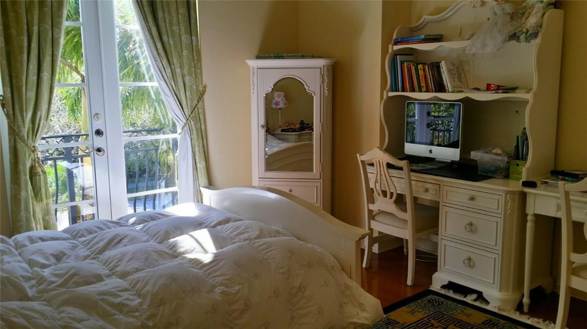17665 Middlebrook Way Boca Raton, FL 33496 - Photo 8 of 17 a bedroom with a bed and a window