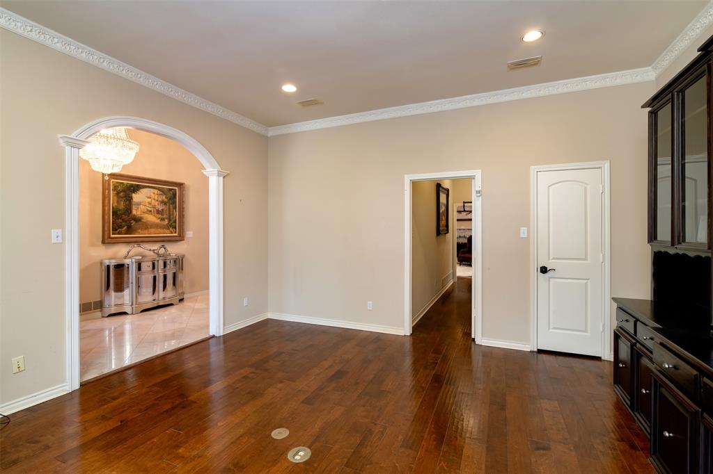 5920 Encore Drive Dallas, TX 75240 - Photo 6 of 34 Wood-finish flooring throughout, featuring a coved ceiling with recessed lighting
