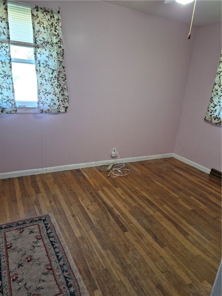 1259 West Bloomfield Road Mendon, NY 14472 - Photo 15 of 24 Warm hardwood floors lay a classic foundation in this 2nd bedroom.