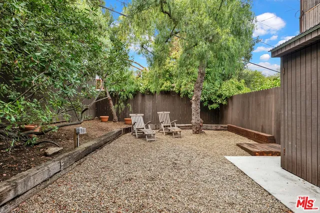 a view of back yard on the deck and deck