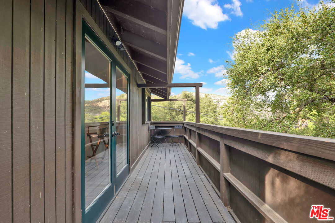 2039 Tuna Canyon Road, Unit A Topanga, CA 90290 - Photo 24 of 28 a view of balcony and wooden floor