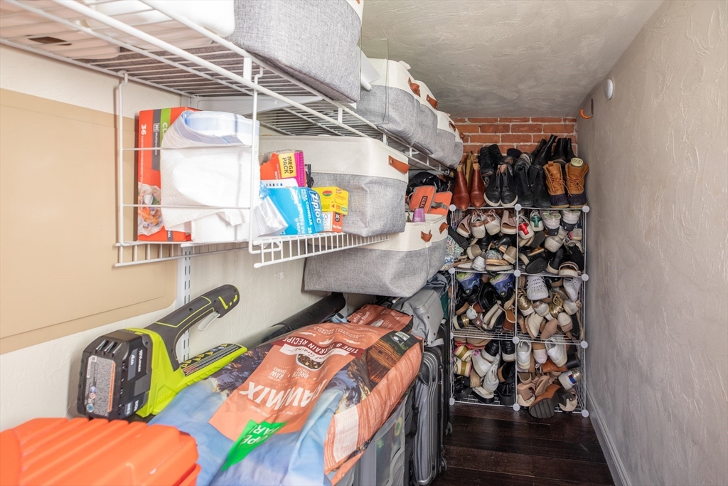 21 Worcester Square, Unit 2 Boston, MA 02118 - Photo 18 of 23 a view of walk in closet with clothes and shoes
