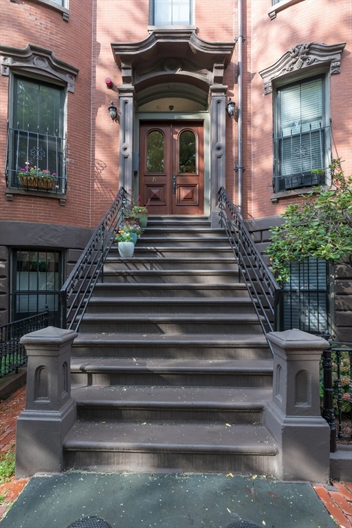 21 Worcester Square, Unit 2 Boston, MA 02118 - Photo 19 of 23 a front view of a house with entryway