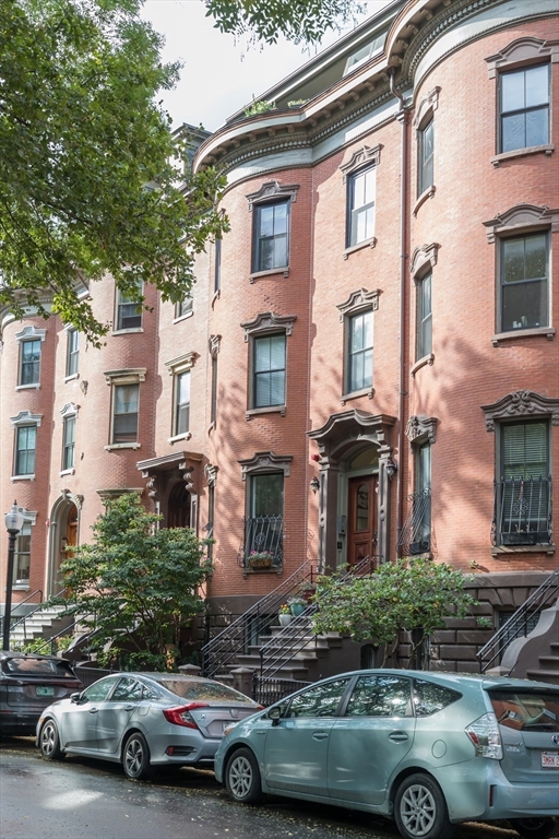 21 Worcester Square, Unit 2 Boston, MA 02118 - Photo 20 of 23 front view of a house with car parked