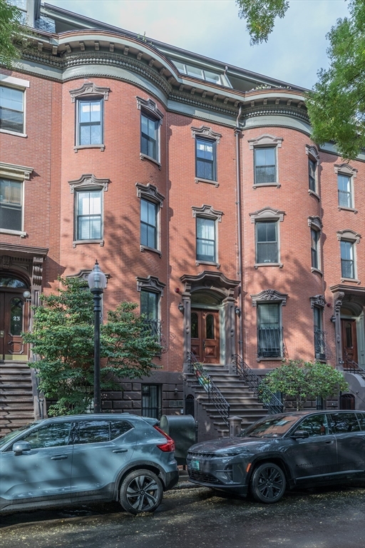21 Worcester Square, Unit 2 Boston, MA 02118 - Photo 21 of 23 a car parked in front of a house