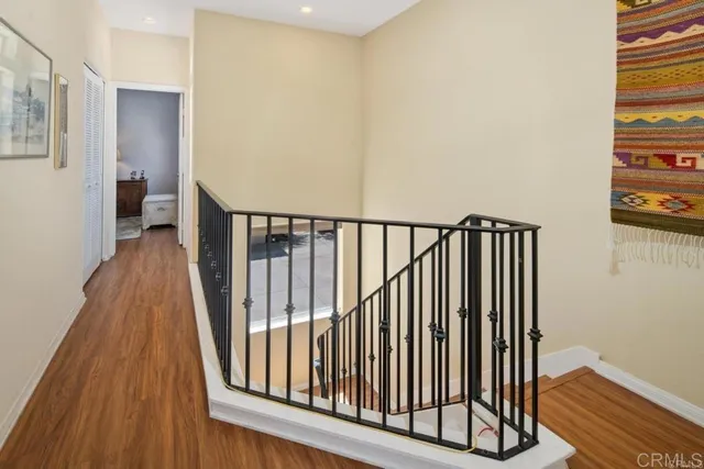 a view of entryway with wooden floor