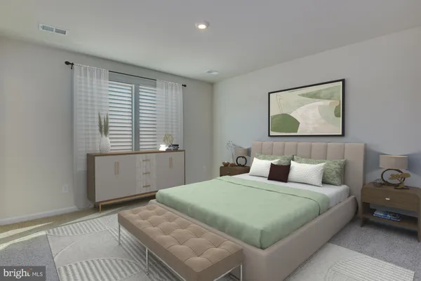 a bathroom with a double vanity sink a mirror and a bathtub